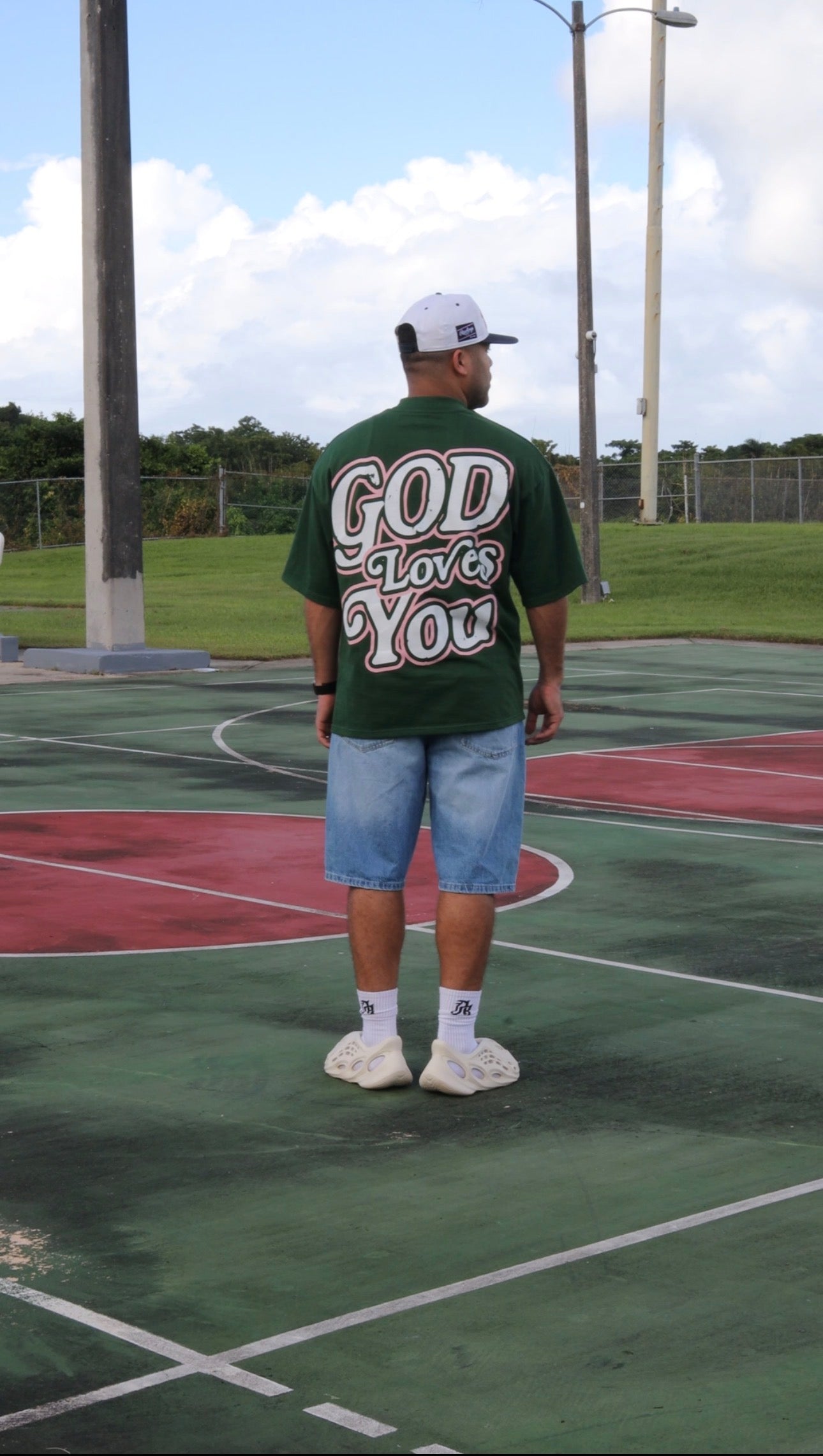 AB Green shirt “God Loves You”